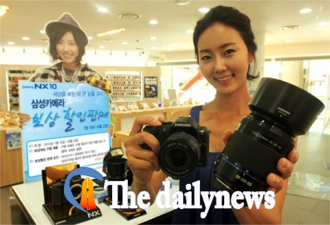 삼성전자, NX 망원렌즈 20만원 보상 할인 판매